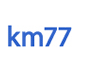 km77